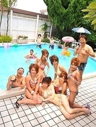 Asian girls pose in bikinis outside Asian girls pose in bikinis outside