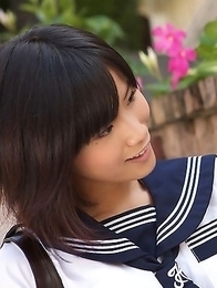 Japan teen Yuzuki Hashimoto in sailor gal uniform is playful outdoor