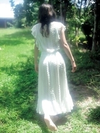 Neo babe in white dress loves feeling her body in water Neo babe in white dress loves feeling her body in water