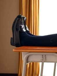 Kaori Ishii is naughty and shows legs under uniform skirt