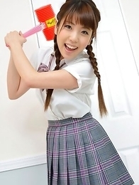 Mizuho Shiraishi with uniform and pigtails plays like child