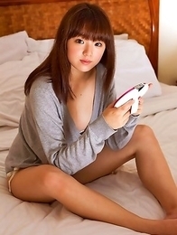 Ai Shinozaki with huge knockers plays with pillows in bed