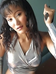 Beautiful Angela Lin shows how dangerous she is! Angela starts posing with knives and she enjoys playing dangerous.