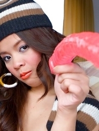 Young asian Pang Piyatida fucks her hairy pussy with a red dildo