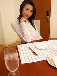 Cat Chonthicha is wearing a white top that she cannot wait to take off. She begins getting naked as this hot babe places her fingers inside of her mou
