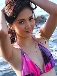 Asian Lolita Cheng posing in the sea
