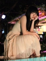 Airi Suzuki in bath suit enjoys petals all over her body