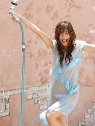 Rola Chen plays with outdoor shower on body over lingerie Rola Chen plays with outdoor shower on body over lingerie