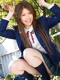Risa Aika with cute smile shows crack in thong under skirt