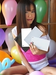 Cookie Wanwalee is home alone after the great balloon party se just had. She is still surrounded by lots of colorful balloons and she is having so muc Cookie Wanwalee is home alone after the great balloon party se just had. She is still surrounded by lots of colorful balloons and she is having so muc