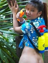 Anna Chung is having so much fun with her water gun. She looks like she could be the next Charlie's angel. Anna Chung is having so much fun with her water gun. She looks like she could be the next Charlie's angel.