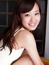 Kana Yuuki in white bath suit moves with grace and passion