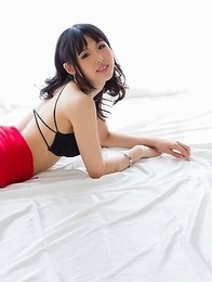 Natsuki Yokoyama posing in a red skirt with black stockings, showing her ass Natsuki Yokoyama posing in a red skirt with black stockings, showing her ass