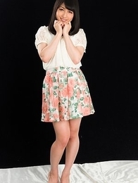 Reo Saionji posing in white lingerie and looking seductive as fuck on camera