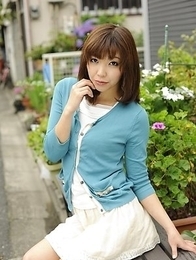 Juri Kitahara in blue sweater and lace skirt